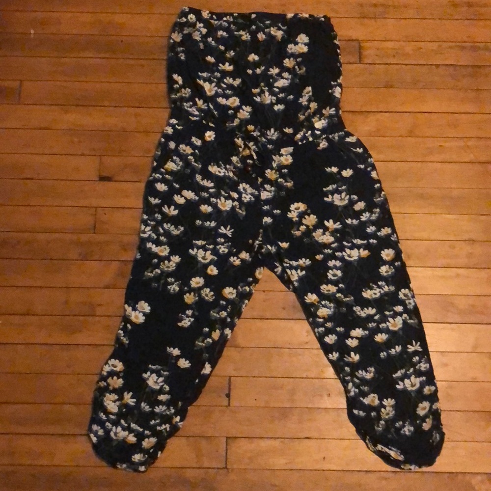 Blue floral jumpsuit. American rag.